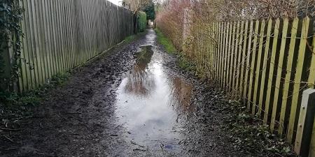 A flooded footpath which will become part of the Rugby Park Connector Network